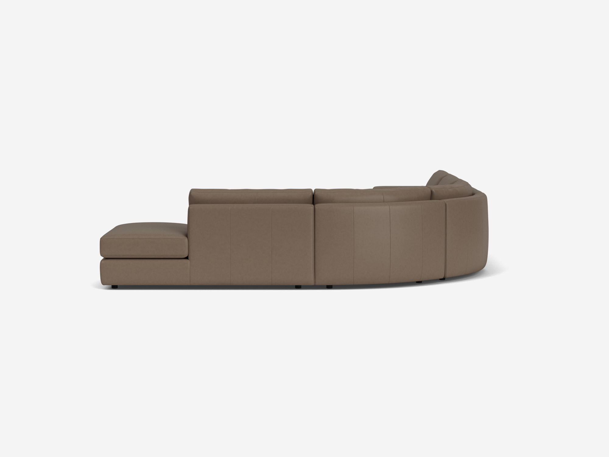 Brown curved leather sectional sofa with right hand chaise right side view